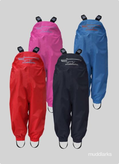 different colour variants of muddlarks® bib-n-brace overalls, blue, pink, red, navy